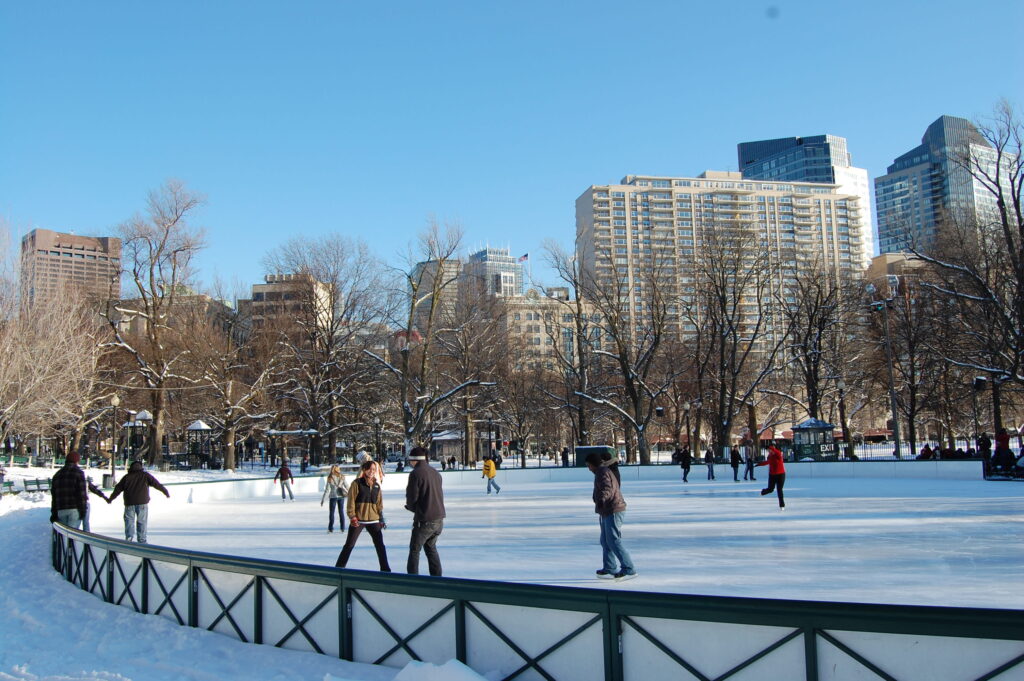 Image of ice skaters on the Frog Pond in Boston in winter.